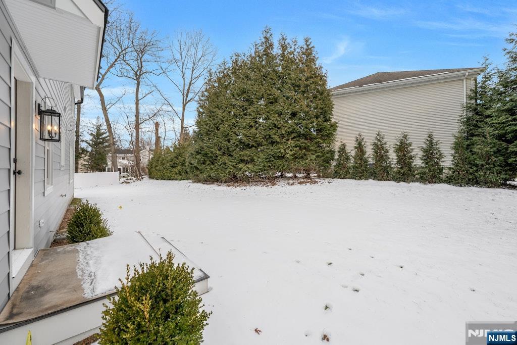 28 North Street Ramsey, NJ 07446 - Photo 47 of 50 a view of white house and covered with snow