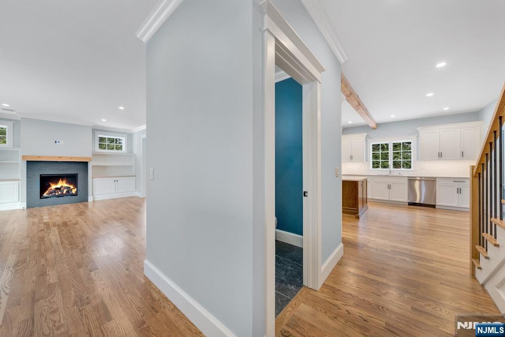 28 North Street Ramsey, NJ 07446 - Photo 7 of 50 a view of a livingroom with wooden floor and a fireplace
