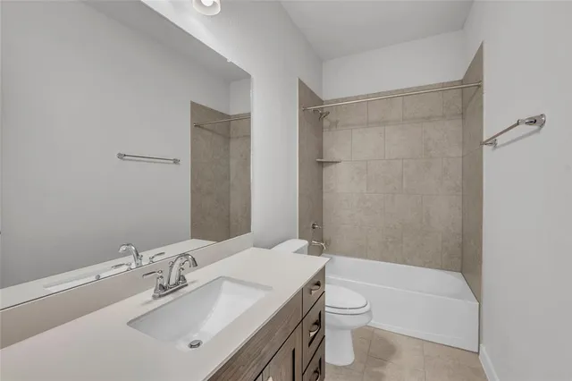 a picture of a bathroom with a shower