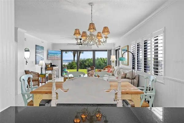 a kitchen with stainless steel appliances kitchen island granite countertop a sink and cabinets