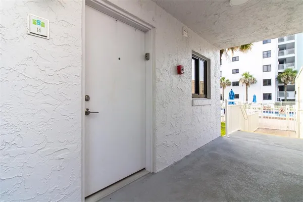 a kitchen with a white cabinets and counter space