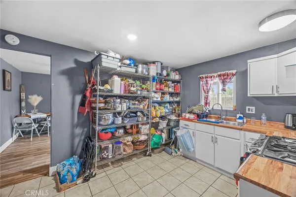 a view of a room with lots of gym equipment