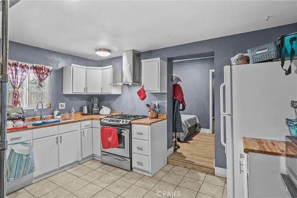 a bathroom with a toilet sink and shower