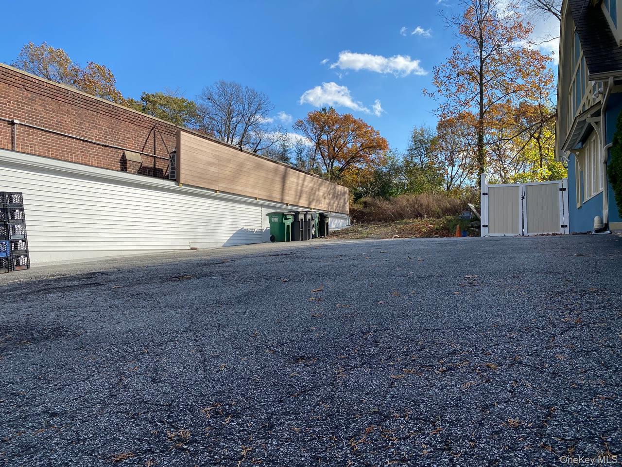 466 Palmer Road Yonkers, NY 10701 - Photo 2 of 11 View of side of property featuring a gate