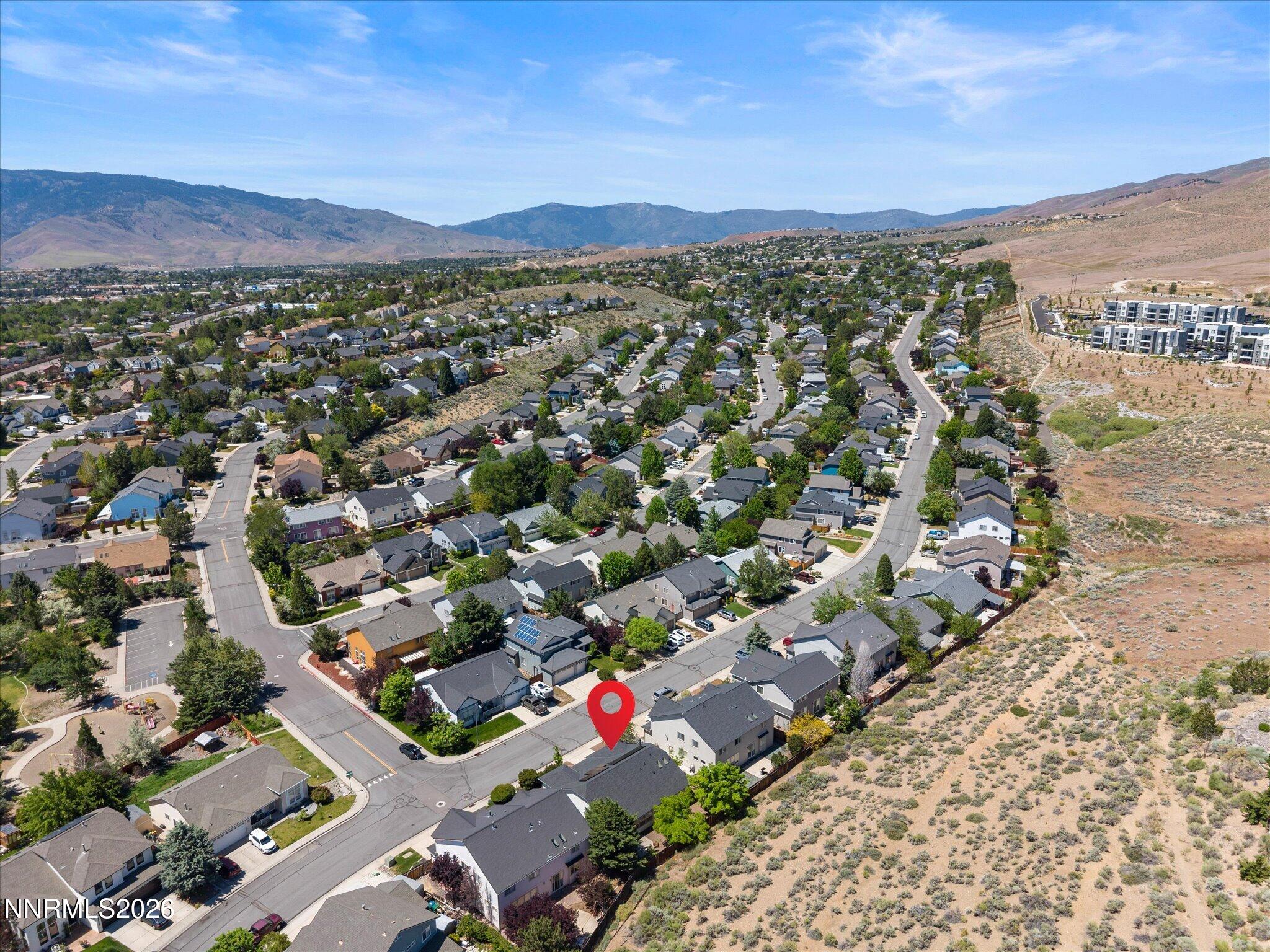 3101 Green River Drive Reno, NV 89503 - Photo 60 of 62 an aerial view of a city with lots of residential buildings