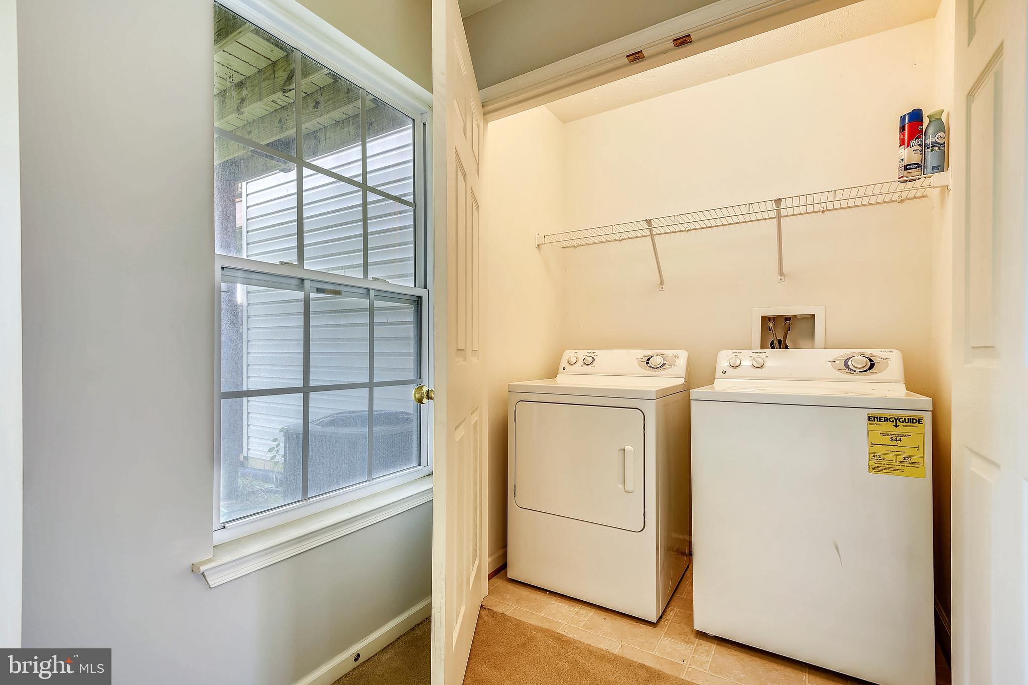 9820 Biggs Road Middle River, MD 21220 - Photo 7 of 35 a utility room with dryer and washer