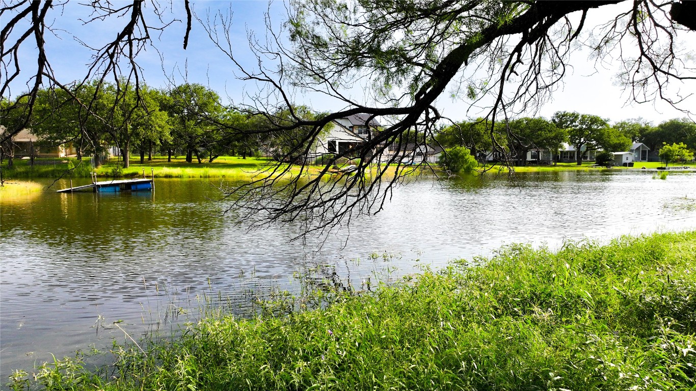 304 North Chaparral Burnet, TX 78611 - Photo 5 of 24 a view of a swimming pool with an outdoor space and seating area