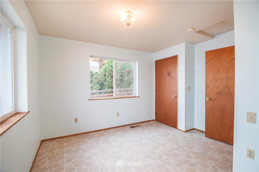 7971 Northeast North Shore Road Belfair, WA 98528 - Photo 15 of 25 a view of an empty room with a window