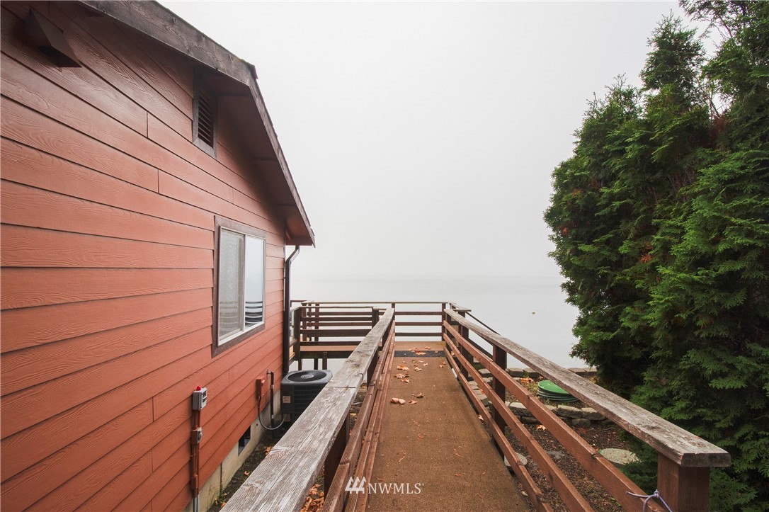 7971 Northeast North Shore Road Belfair, WA 98528 - Photo 20 of 25 a view of balcony and wooden floor