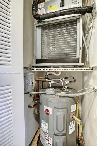 a utility room with washer and dryer
