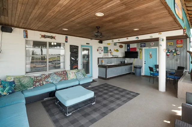 a view of a porch with furniture