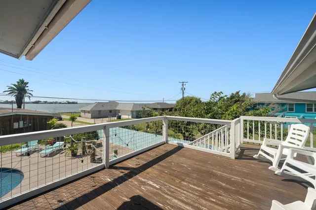 a view of a swimming pool with a patio