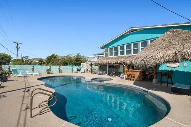 a view of a terrace with chairs