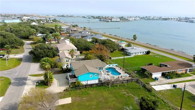 an aerial view of a houses with outdoor space