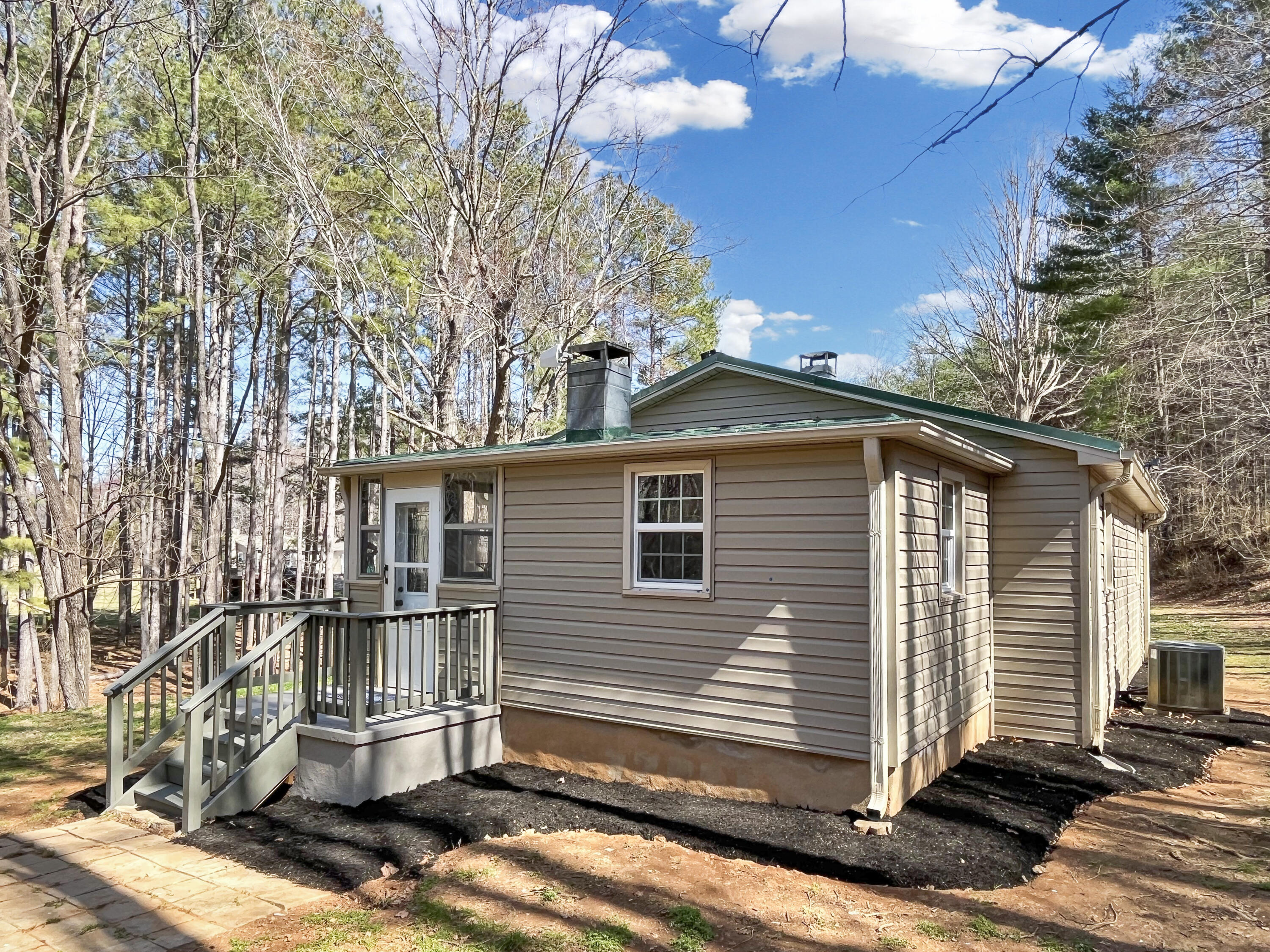 777 Fairfield Road Bassett, VA 24055 - Photo 25 of 44 a front view of a house with a yard