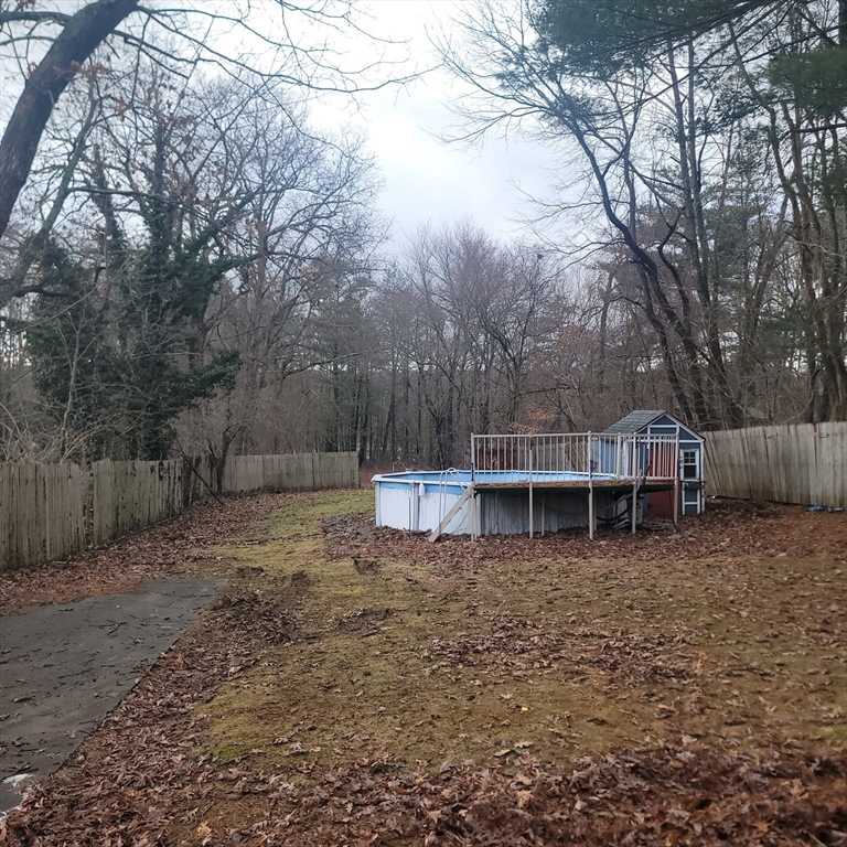 36 Wallace Road Sturbridge, MA 01566 - Photo 16 of 18 a view of a house with a yard