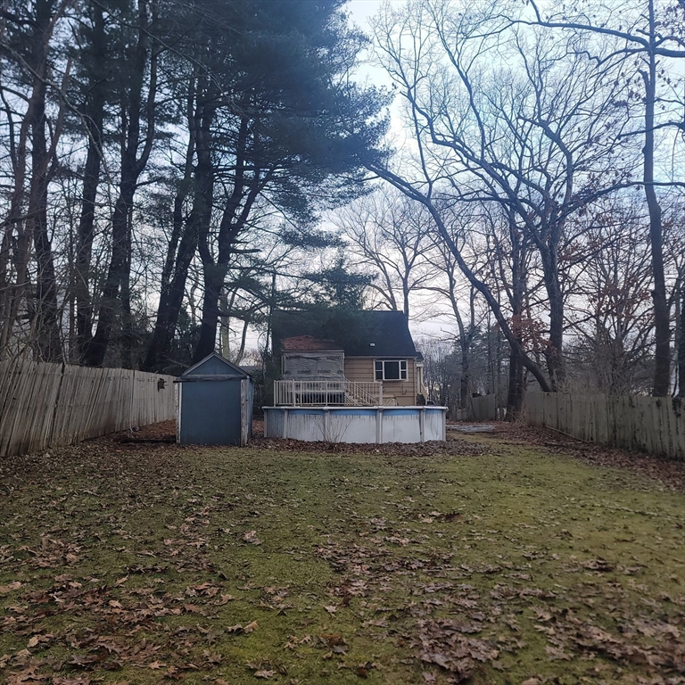 36 Wallace Road Sturbridge, MA 01566 - Photo 17 of 18 a view of a yard with large trees