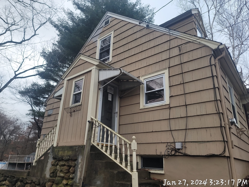 36 Wallace Road Sturbridge, MA 01566 - Photo 2 of 18 a view of a house with a window