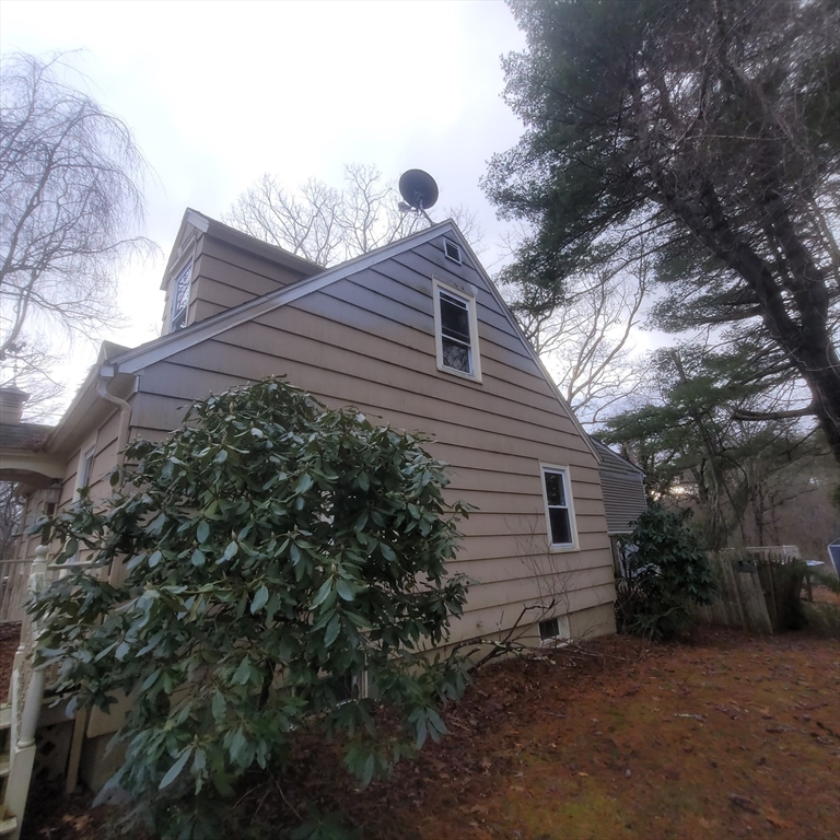 36 Wallace Road Sturbridge, MA 01566 - Photo 3 of 18 a backyard of a house with lots of green space