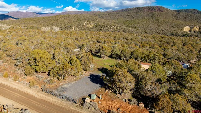 a view of ocean and mountain