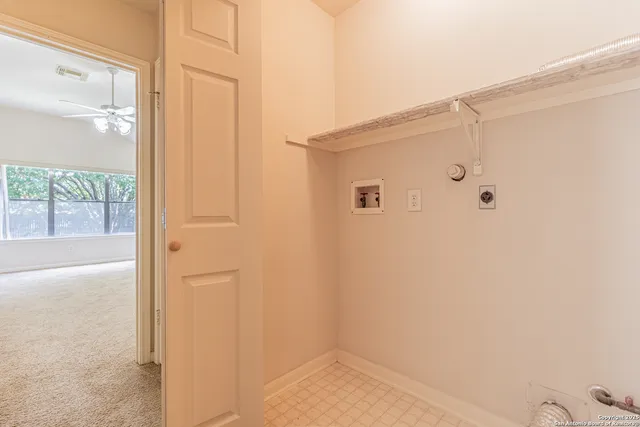 a view of a back yard with green space