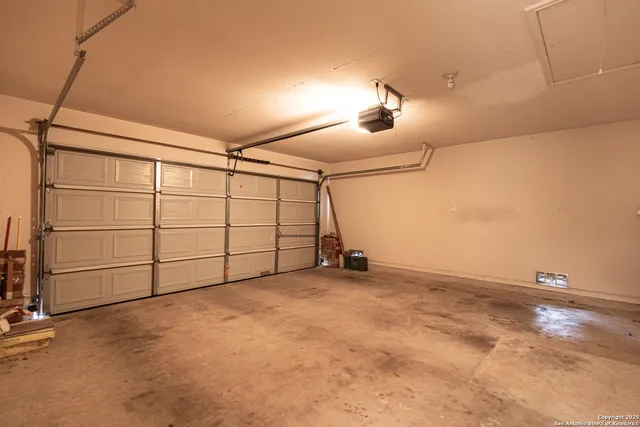 a front view of a house with a garden and yard