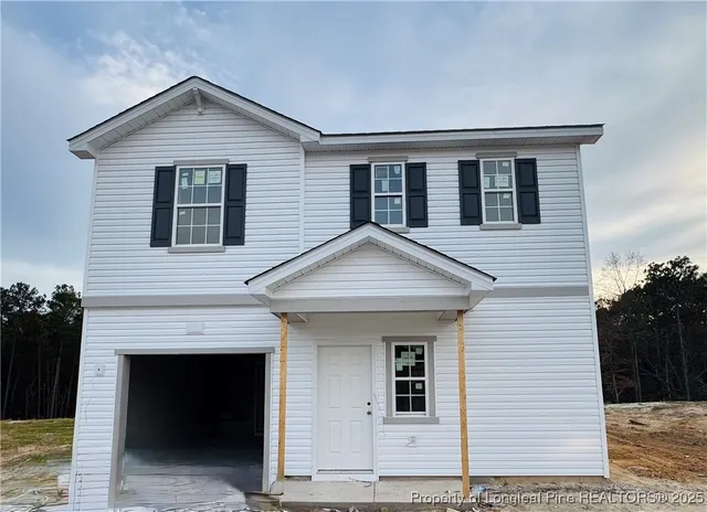 a front view of a house with a balcony