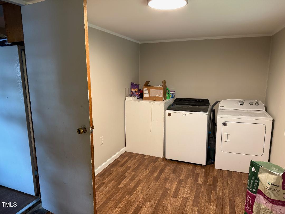 1196 Cash Road Creedmoor, NC 27522 - Photo 15 of 16 a utility room with dryer and washer