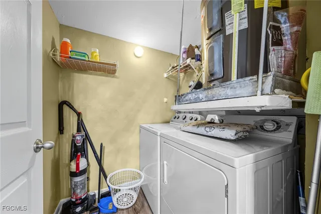 a utility room with dryer and washer