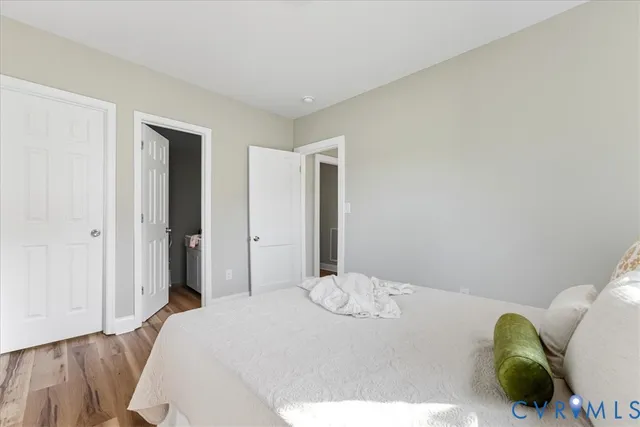 a bathroom with a shower and toilet