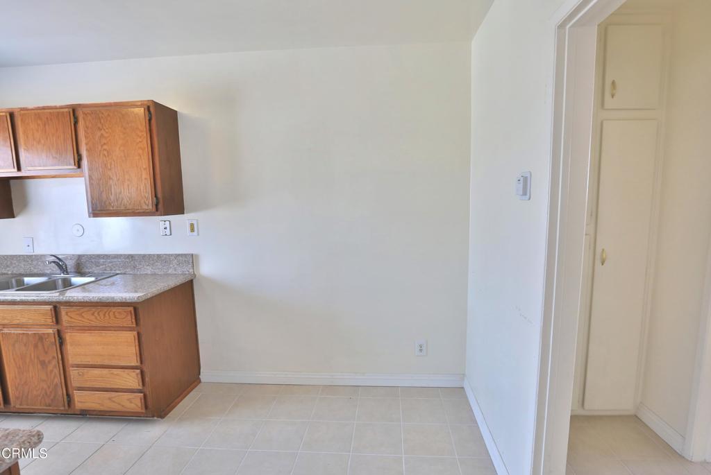 124 South Olive Avenue, Unit B Alhambra, CA 91801 - Photo 6 of 12 a bathroom with a sink and a mirror
