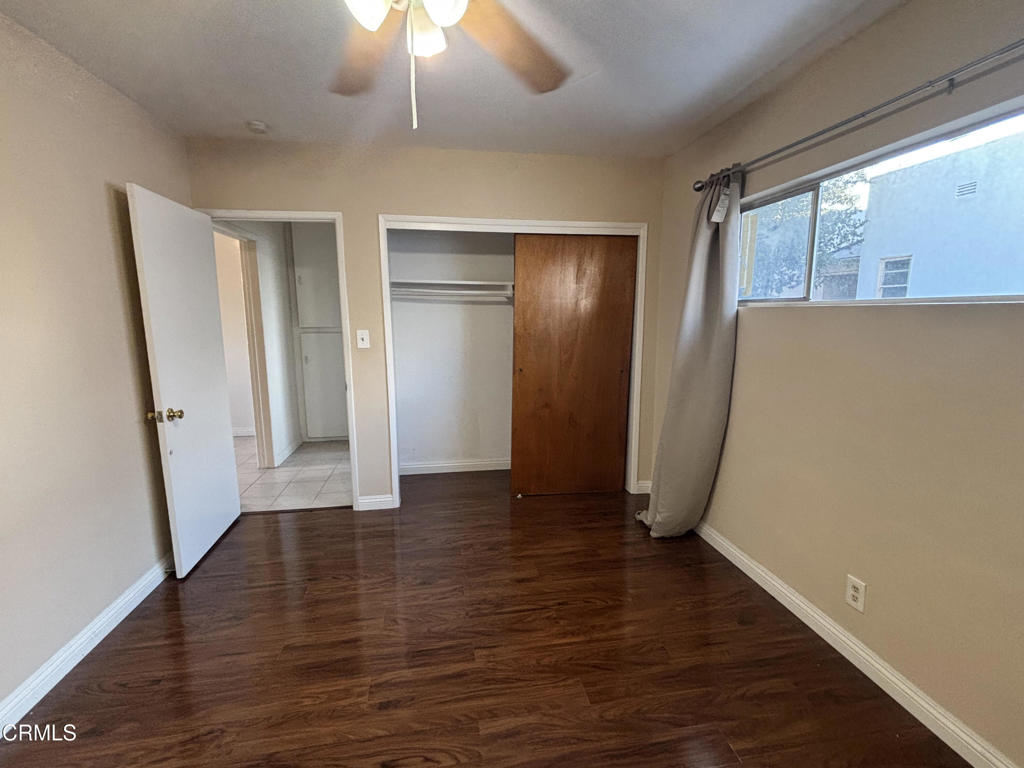124 South Olive Avenue, Unit B Alhambra, CA 91801 - Photo 8 of 12 a view of empty room with wooden floor and window