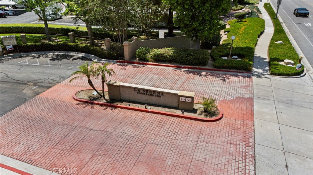 10151 Arrow Route, Unit 6 Rancho Cucamonga, CA 91730 - Photo 18 of 24 a view of a park with potted plants