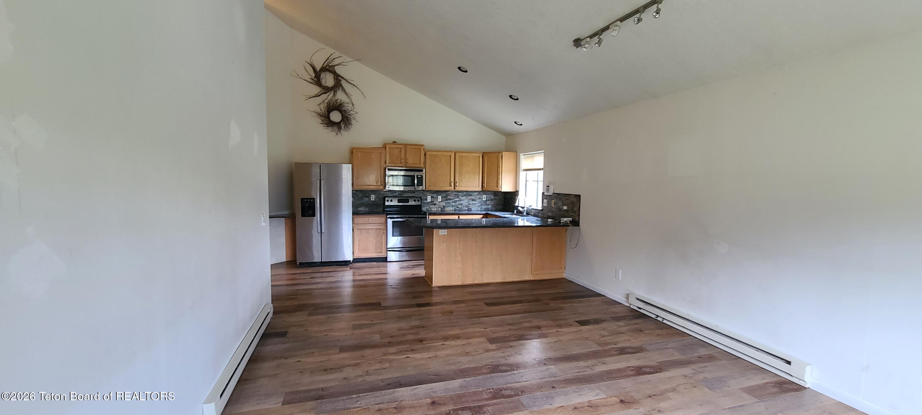 469 Greys River Loop Alpine, WY 83128 - Photo 10 of 24 Kitchen from Family Room