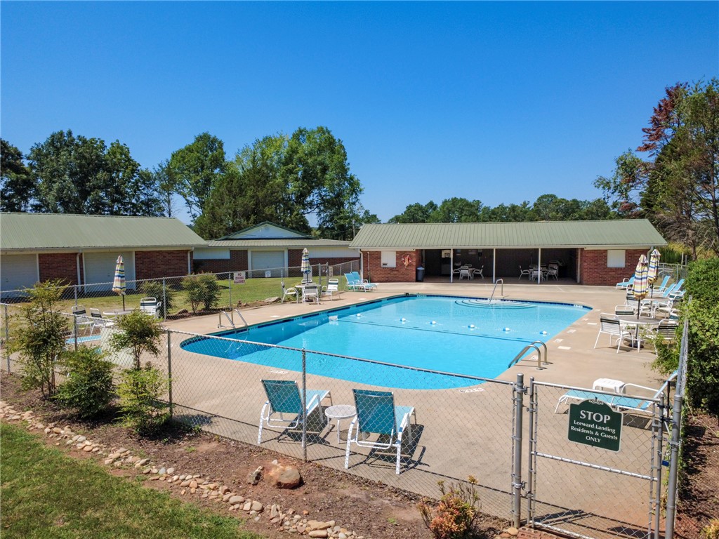 1302 Leeward Road Anderson, SC 29625 - Photo 49 of 50 Relax poolside at this community pool, offering ample space for leisure and social gatherings.