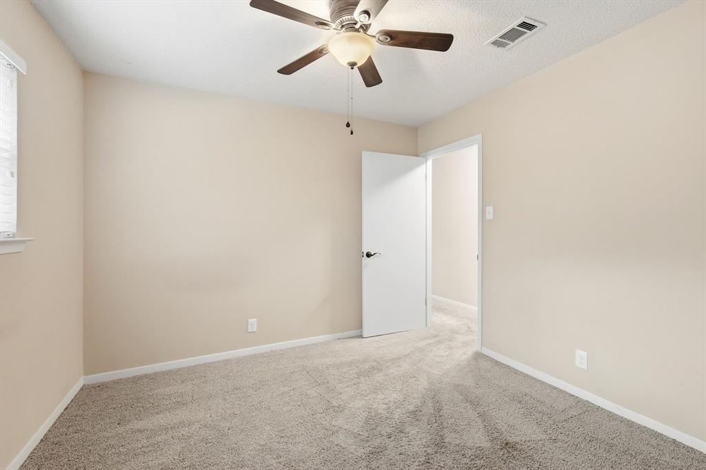324 Moore Creek Road Hurst, TX 76053 - Photo 17 of 22 a view of an empty room