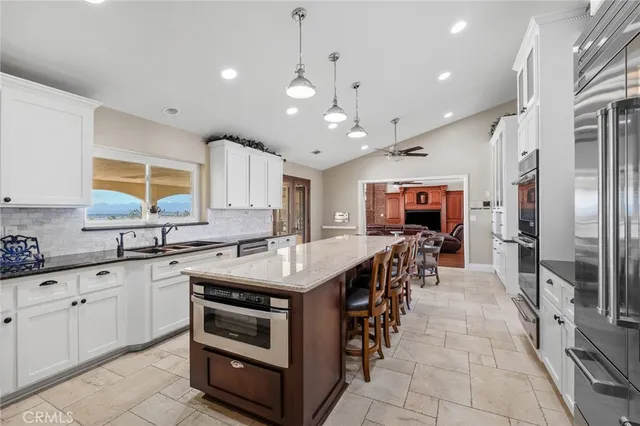 a kitchen with a sink and a window