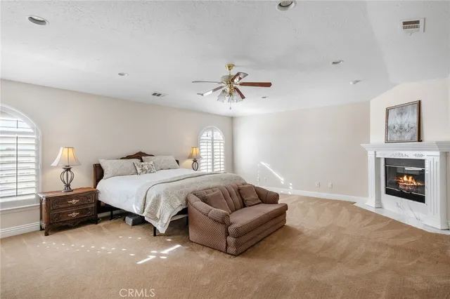 a bathroom with a double vanity sink mirror and a shower