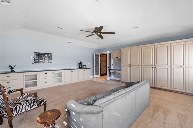 a spacious bathroom with a granite countertop sink toilet and shower