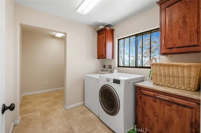 a view of room with window ceiling fan and hardwood floor