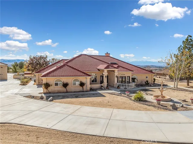 a view of an entryway with wooden floor and stairs