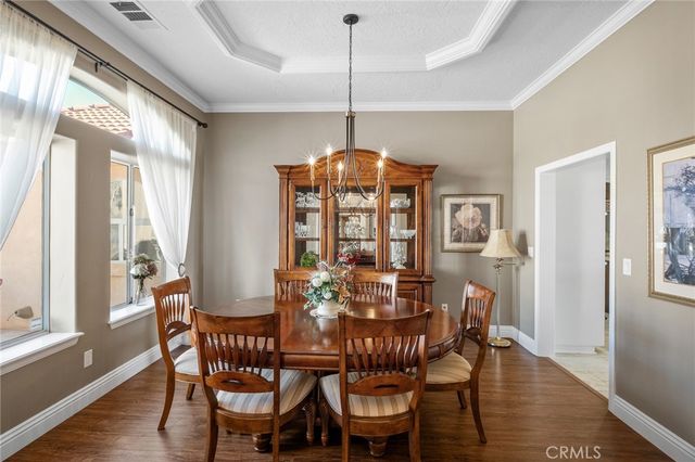 a living room with furniture fireplace and flat screen tv