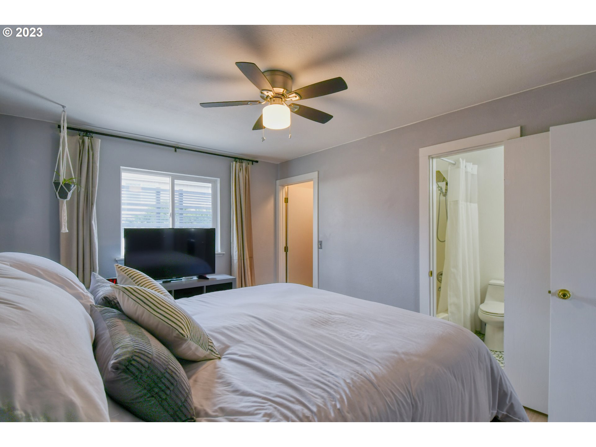 1320 Southwest 37th Street Pendleton, OR 97801 - Photo 15 of 31 a bedroom with a bed and a flat screen tv