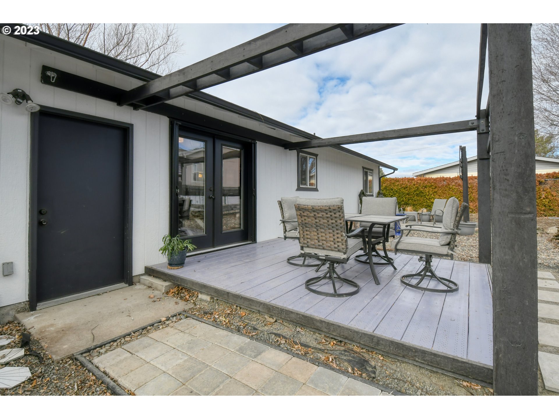 1320 Southwest 37th Street Pendleton, OR 97801 - Photo 28 of 31 a view of a patio with table and chairs and potted plants