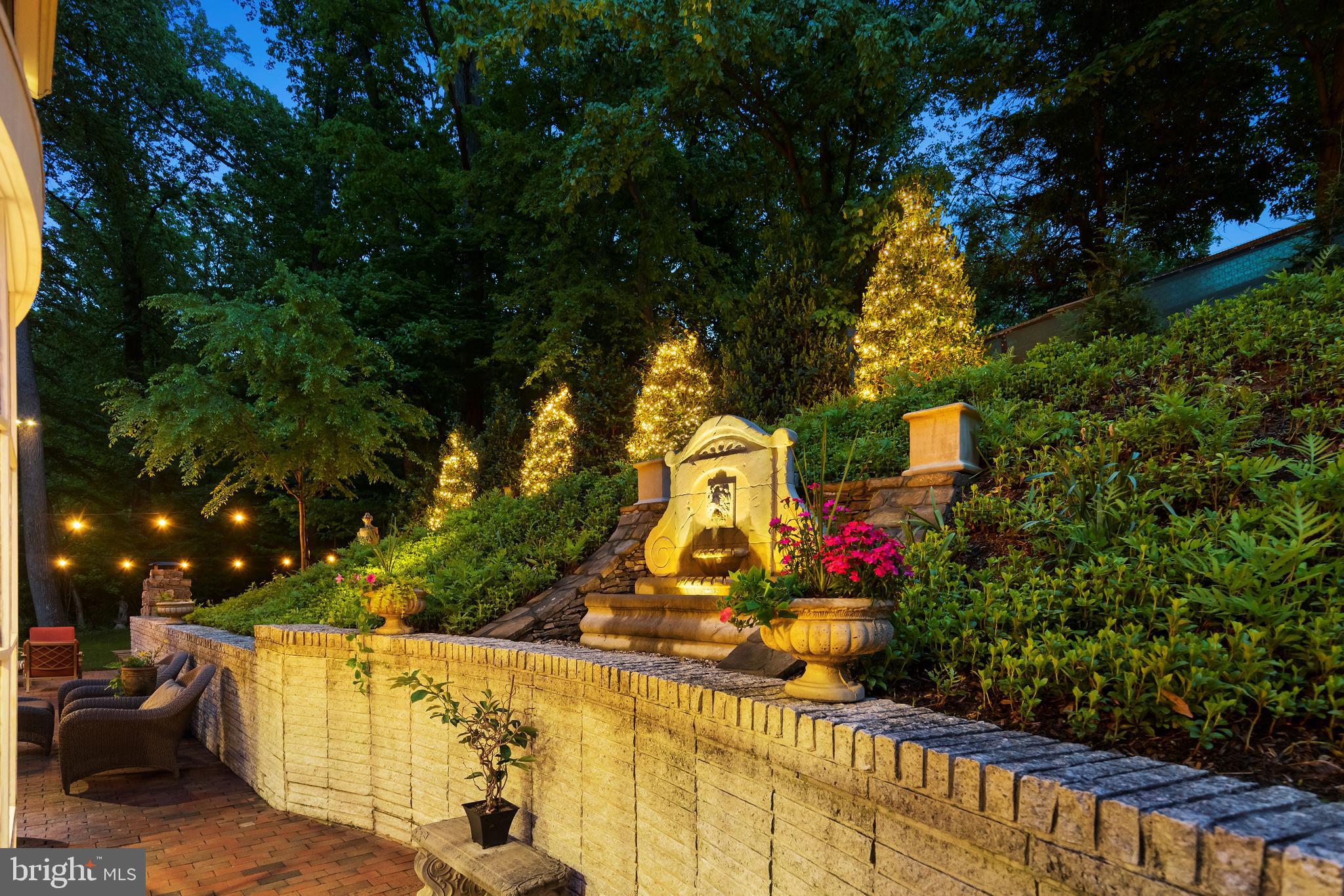 8751 Brook Road McLean, VA 22102 - Photo 102 of 103 a view of fountain along the path and trees in the background