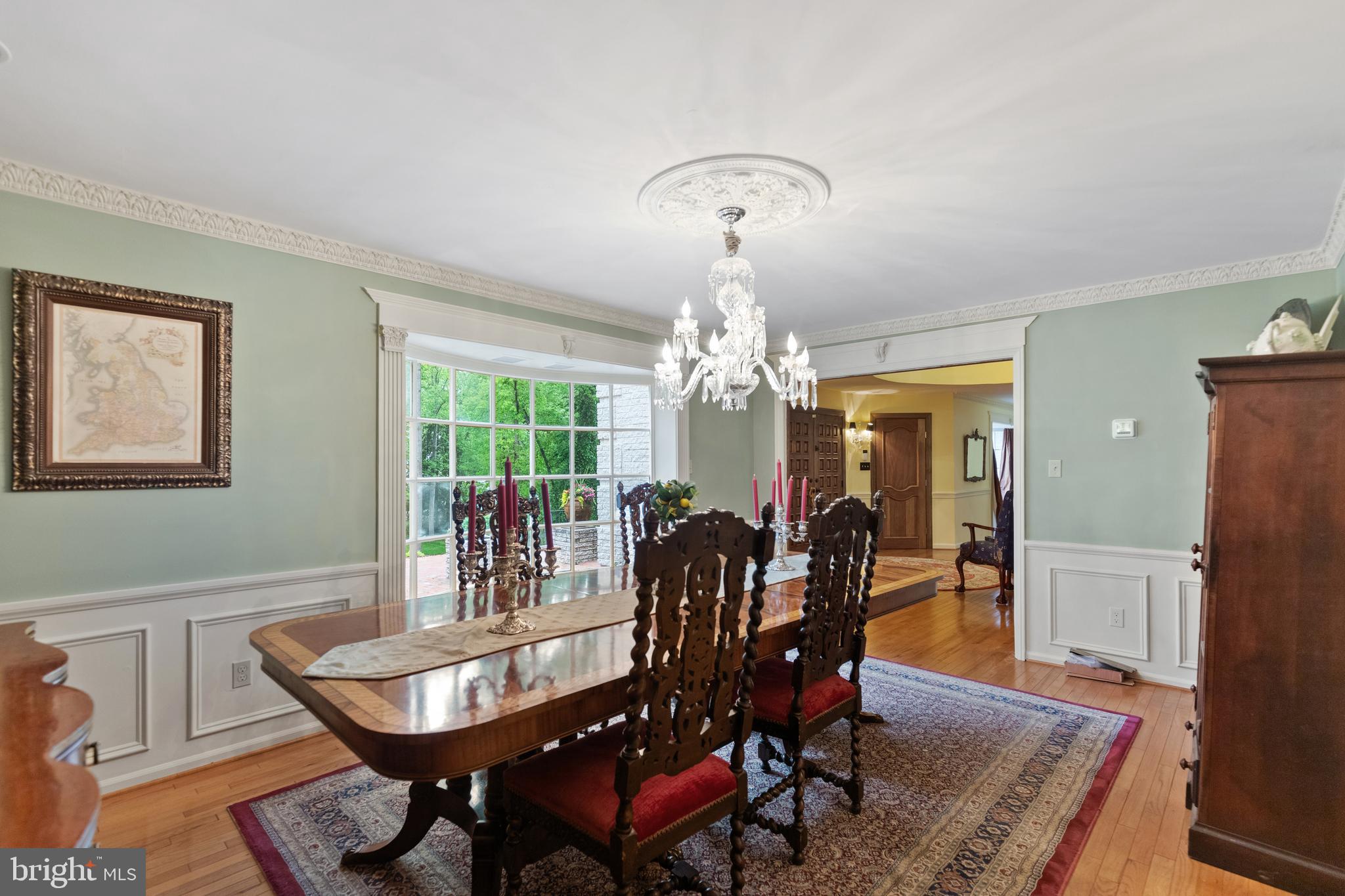 8751 Brook Road McLean, VA 22102 - Photo 16 of 103 a view of a dining room with furniture window and wooden floor