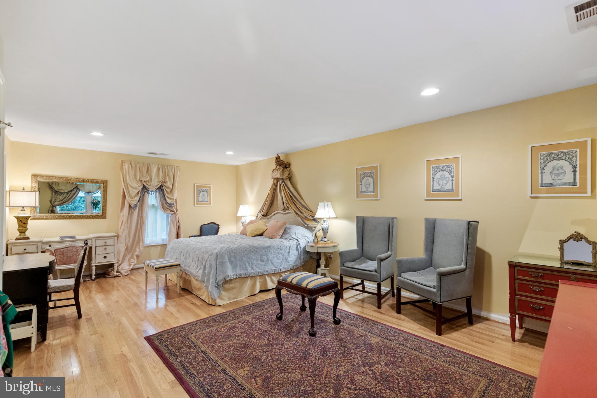8751 Brook Road McLean, VA 22102 - Photo 36 of 103 a living room with furniture a rug and a table