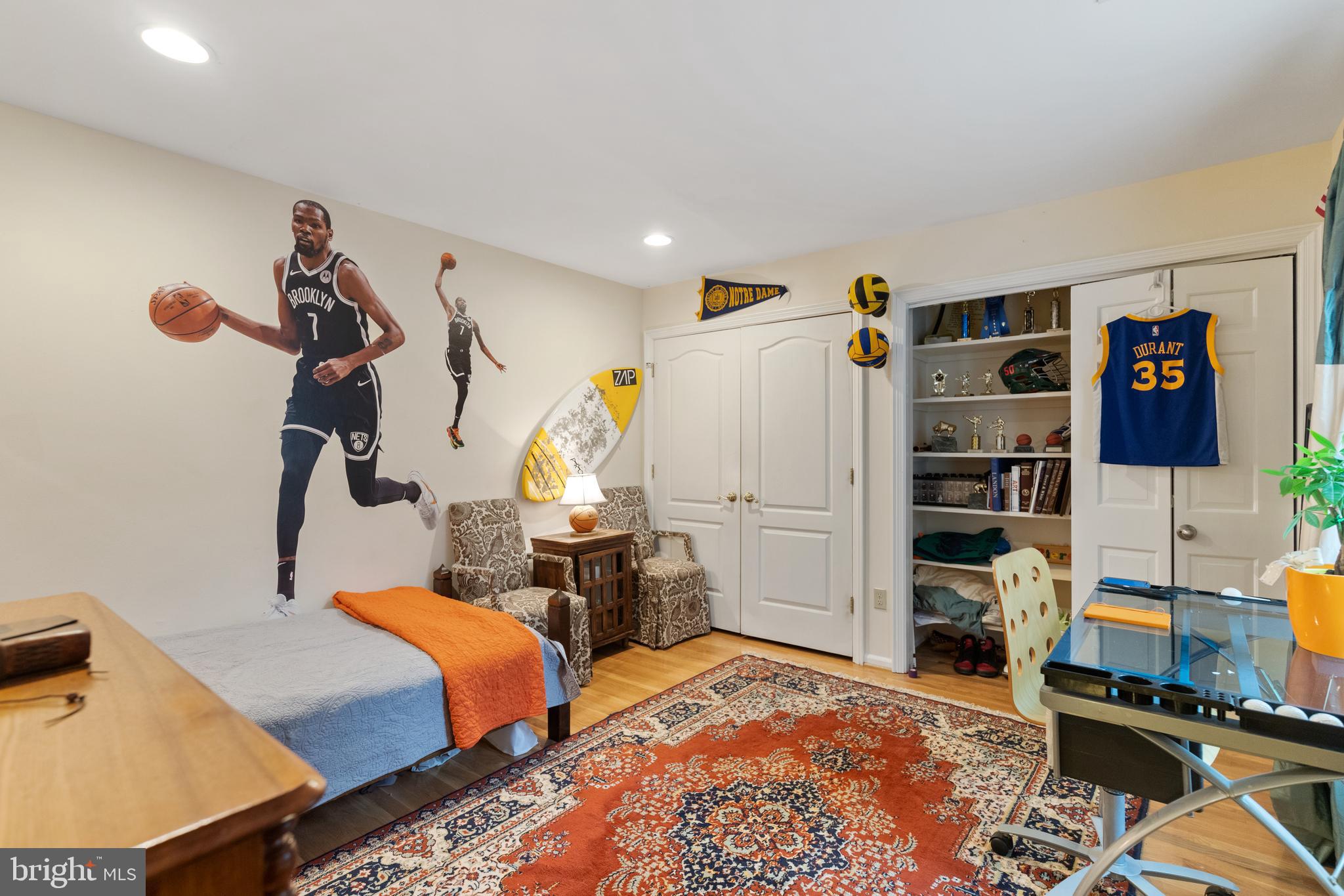 8751 Brook Road McLean, VA 22102 - Photo 37 of 103 a bedroom with bed and a closet