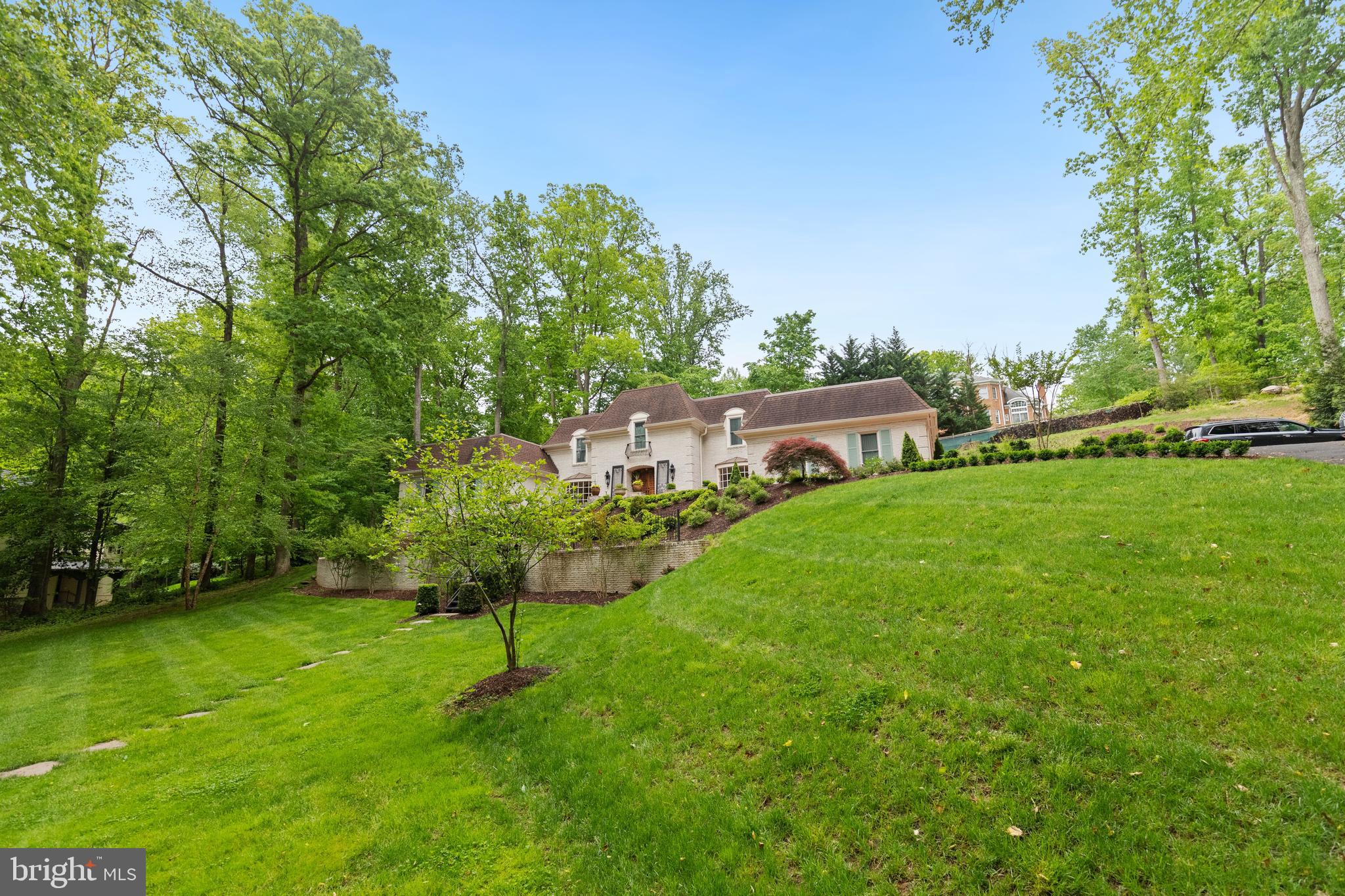 8751 Brook Road McLean, VA 22102 - Photo 55 of 103 a view of a house with a yard