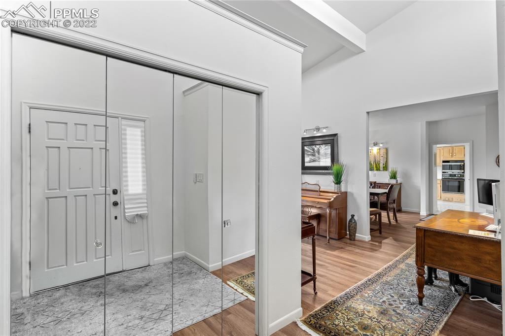 3105 Broadmoor Valley Road, Unit D Colorado Springs, CO 80906 - Photo 9 of 27 a view of a livingroom with furniture and window